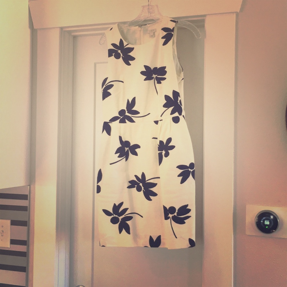 J Cree cream and black dress